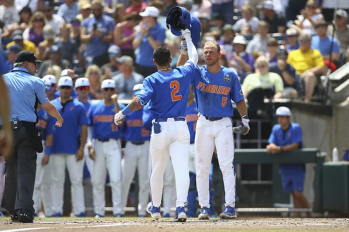 Florida sets College World Series record for runs with 24-4 win over LSU to force deciding Game 3