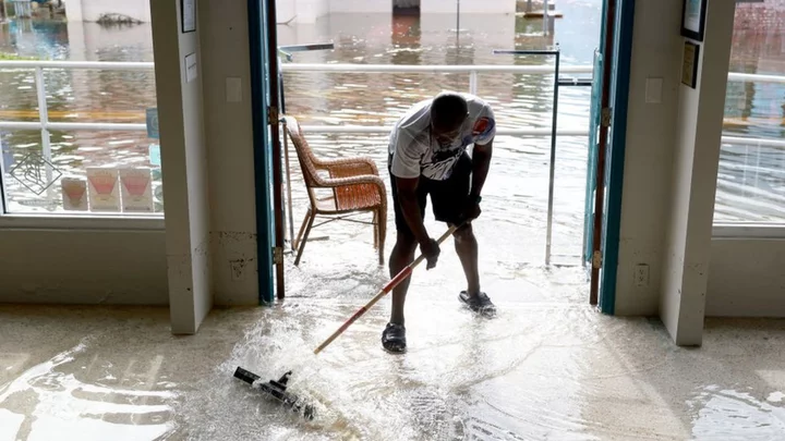 Tropical Storm Idalia drenches Carolinas as Florida counts cost