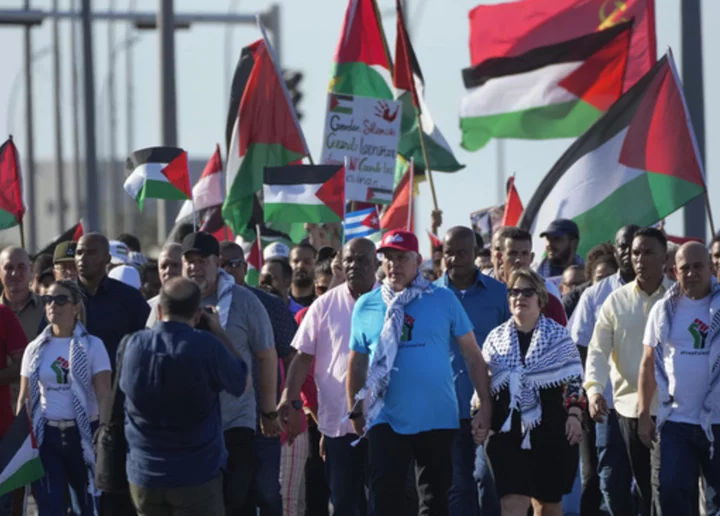 Thousands led by Cuba's president march in Havana in solidarity with Palestinian people