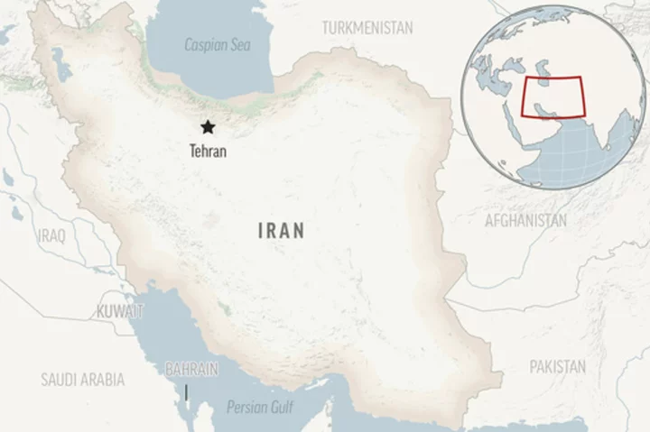 Gunfire erupts at prominent Shiite shrine in southern Iran, wounding at least 4 people