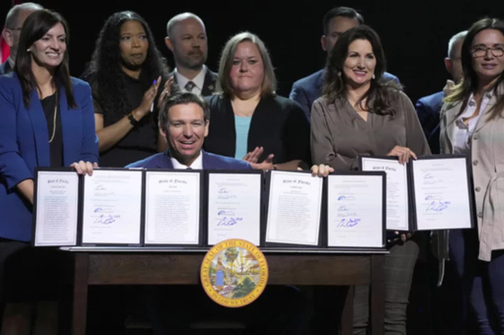 DeSantis signs bills targeting drag shows, pronouns, bathroom use and transgender children