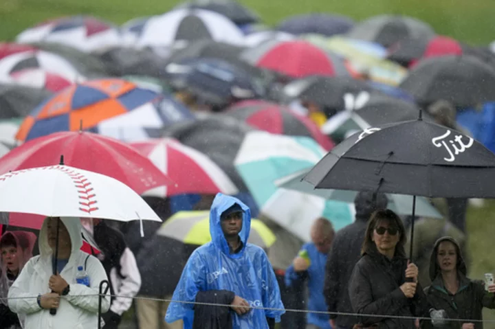 PGA Live Updates | Co-leaders Scheffler, Hovland and Conners tee off at soggy PGA