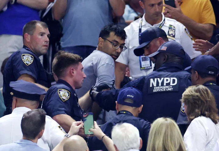 OLD Chaos as climate protesters disrupt Coco Gauff semifinal at US Open, glueing feet to floor