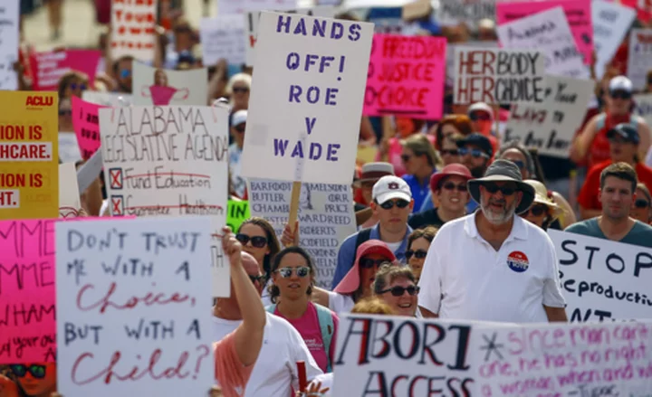 Things to know about efforts to block people from crossing state lines for abortion