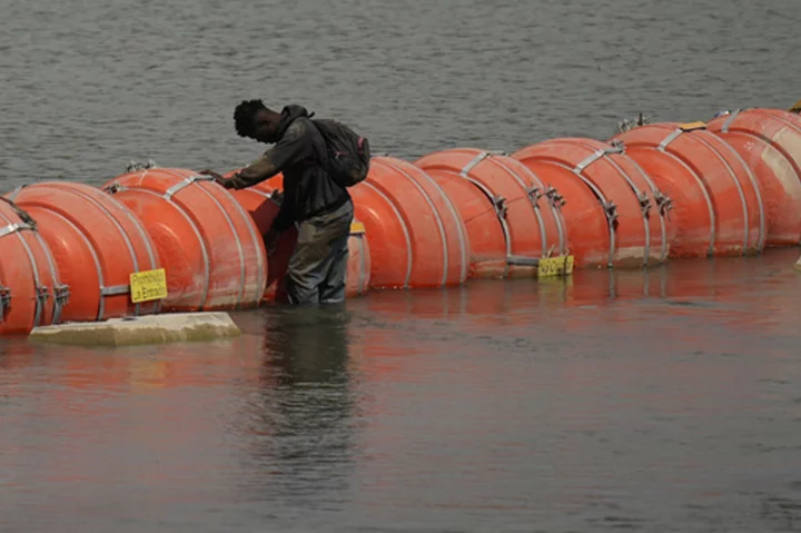 Court order allows Texas' floating barrier on US-Mexico border to remain in place for now