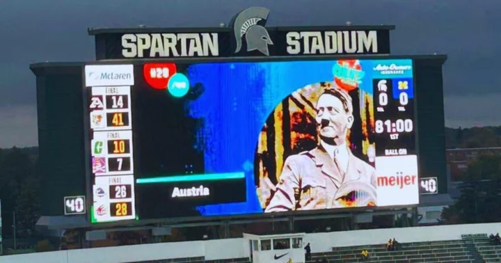 If Adolf Hitler is the answer, what's the question? Michigan State slammed for beaming Hitler on videoboard