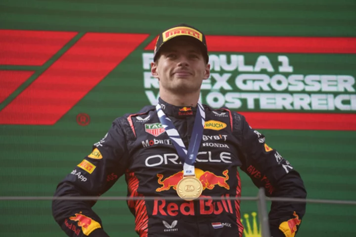 Red Bull driver Max Verstappen stays on track for F1 title after winning chaotic Austrian GP