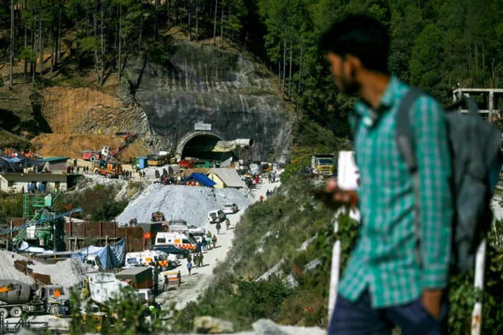 Indian army digs by hand to free 41 trapped tunnel workers