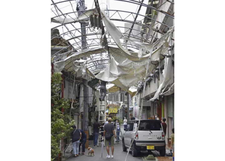 Typhoon Khanun forecast to turn back to Japanese islands where it already left damage and injuries