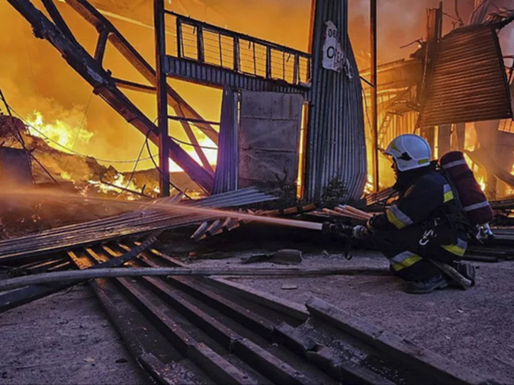 Russian drone attack on a city in western Ukraine sparks an inferno at a warehouse and kills 1