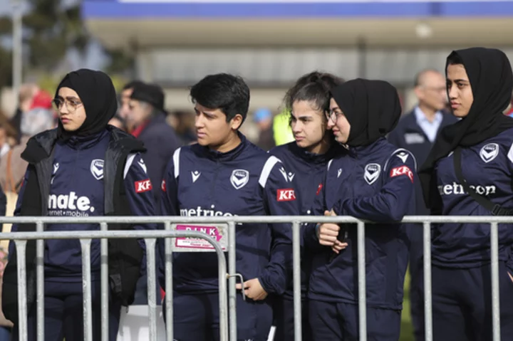 Afghan players watch Morocco's team practice for Women's World Cup, hoping to get their chance