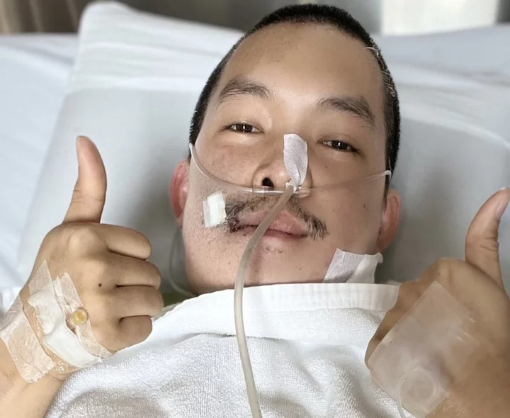 Laos activist who survived shooting leaves country