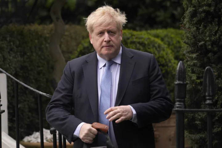 Boris Johnson rewards allies, and a hairdresser, with honors as critics cry foul