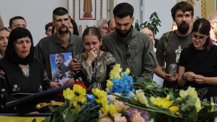 Ukraine war: Hundreds bid farewell to fighter ace Juice