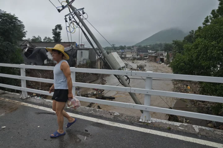 11 dead and 27 missing in flooding around Beijing after days of rain, Chinese state media report