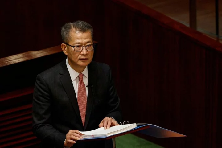 Hong Kong finance chief to attend APEC meet, side-stepping dispute